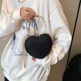 Piper Heart Clutch Handbag